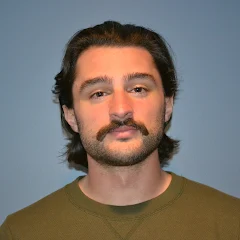 Headshot photograph of Korbin Burkhardt